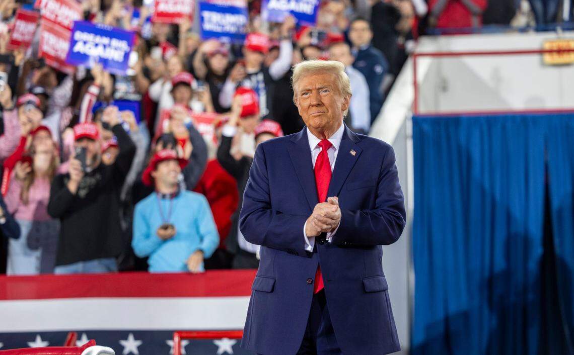 Republican presidential nominee and former President Donald Trump takes the stage during a rally at Dorton Arena in Raleigh on Monday, Nov. 4, 2024, one day before Election Day.
