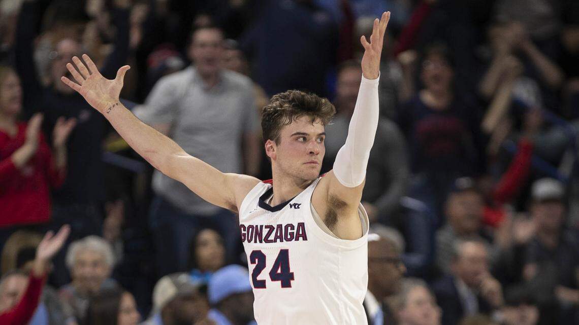 Gonzaga’s Corey Kispert (24) reacts after a three-point basket in front of the North Carolina bench to put the Bulldogs’ up 34-23 during the first half on Wednesday, December 18, 2019 at McCarthey Athletic Center in Spokane, Washington.