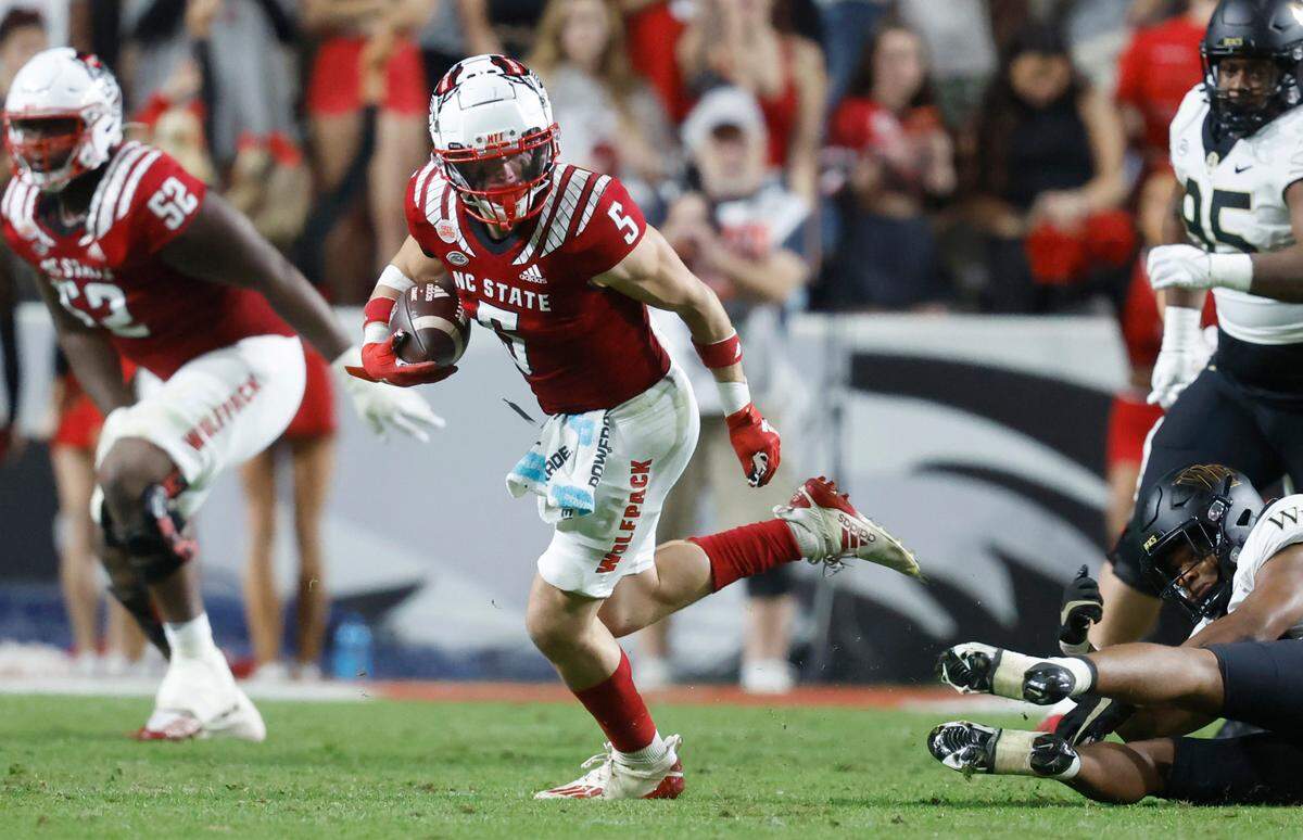 N.C. State wide receiver Thayer Thomas (5) breaks free during the second half of N.C. State’s 30-21 victory over Wake Forest at Carter-Finley Stadium in Raleigh, N.C., Saturday, Nov. 5, 2022.
