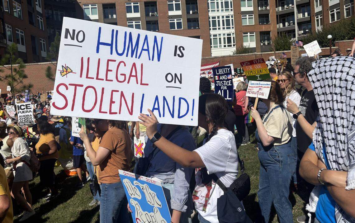 Immigration was the subject of many signs at the Durham, N.C. No Kings protest, Saturday.