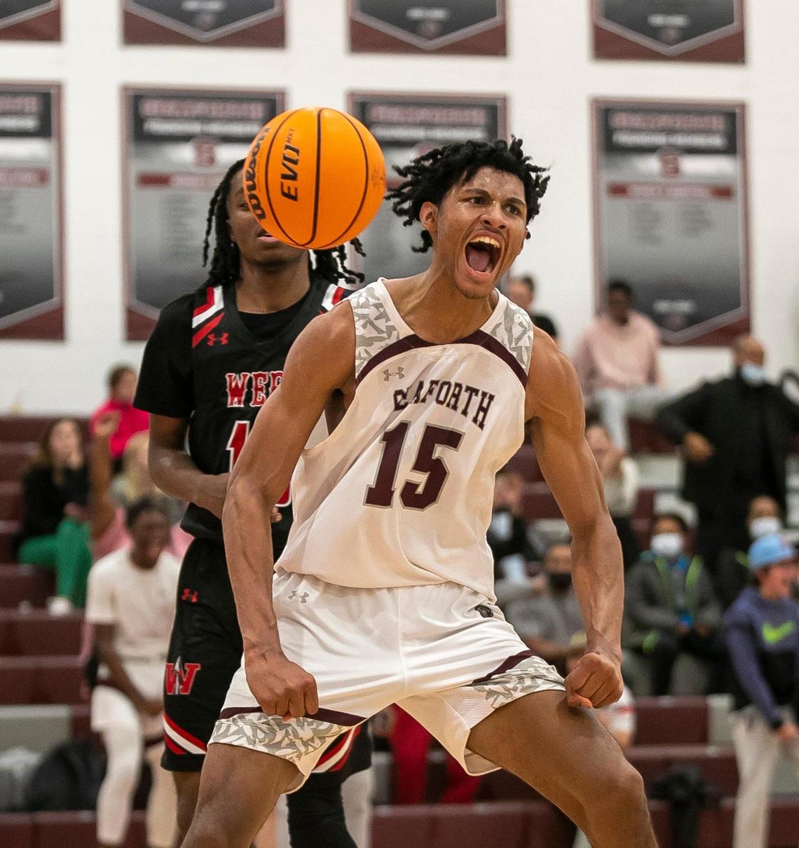 Seaforth High School’s Jarin Stevenson reacts after a dunk on a fast break against J.F. Webb High School on November 29, 2022 in Pittsboro, N.C. Stevenson scored 33 points in the win.