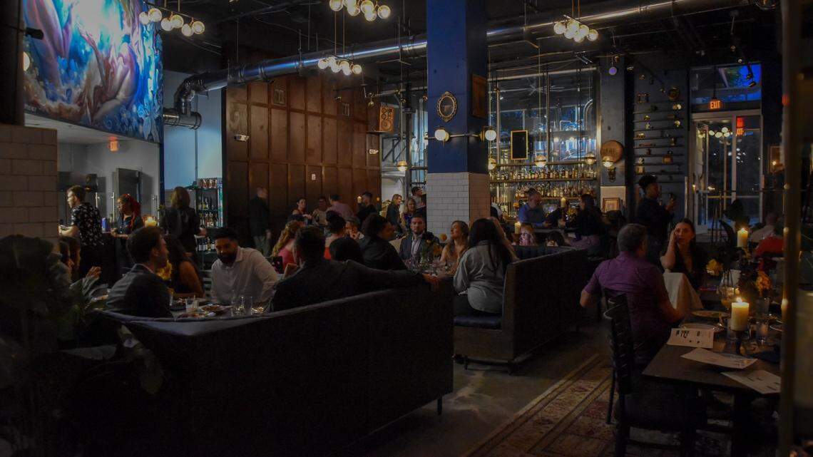 The dining room of the new Raleigh restaurant Flour & Barrel revives the former Little City Brewing space.