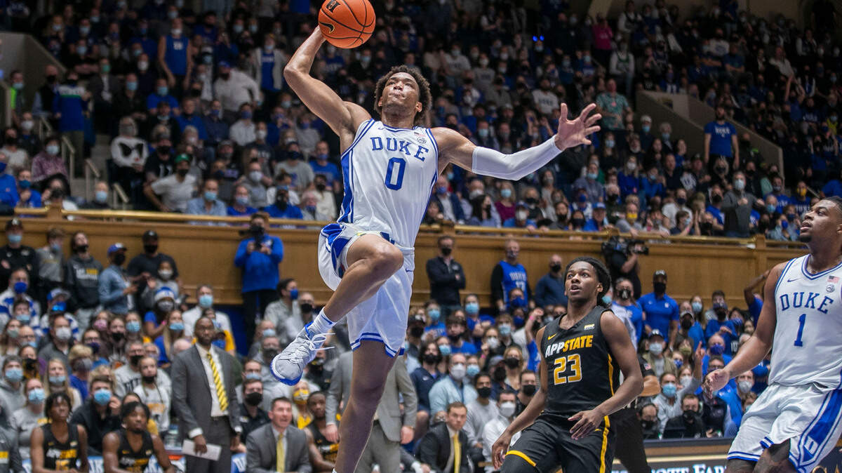Duke’s Wendell Moore Jr. (0) soars to the basket for a dunk in the first half against Appalachian State on Wednesday, Thursday 16, 2021 at Cameron Indoor Stadium in Durham, N.C.