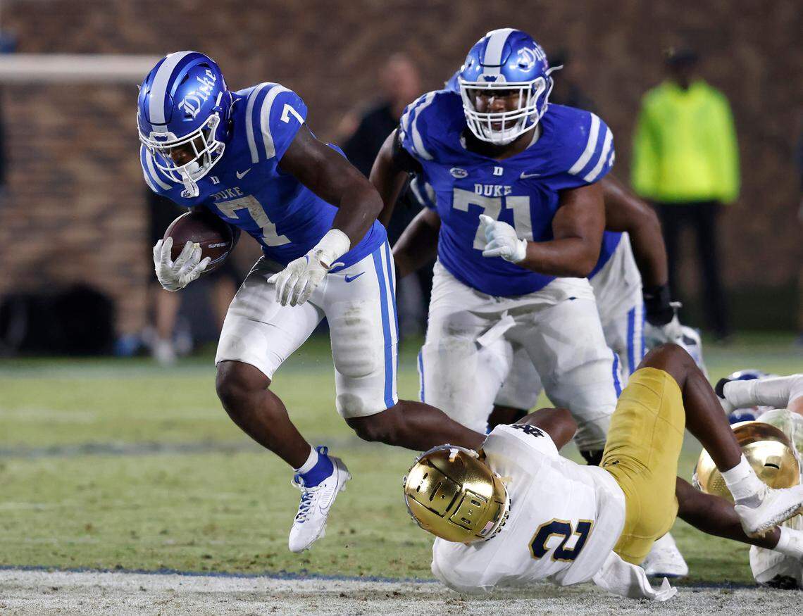 Duke’s Jordan Waters is brought down by Notre Dame’s DJ Brown during the second half of the Blue Devils’ 21-14 loss at Wallace Wade Stadium on Saturday, Sept. 30, 2023, in Durham, N.C.