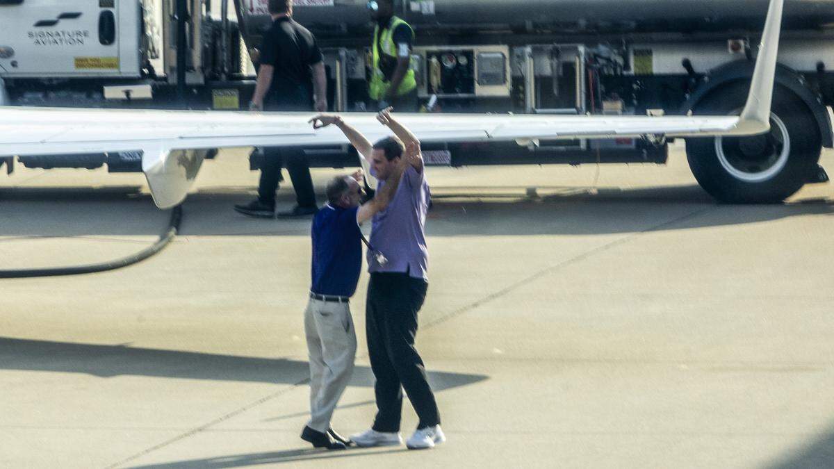 Former NC State basketball coach Will Wade is greeted on the tarmac at Raleigh-Durham International Airport in Morrisville on Thursday, March 26, 2026. Wade confirmed at about 1 p.m. Thursday that he has resigned at NC State to take the head coaching job at LSU.