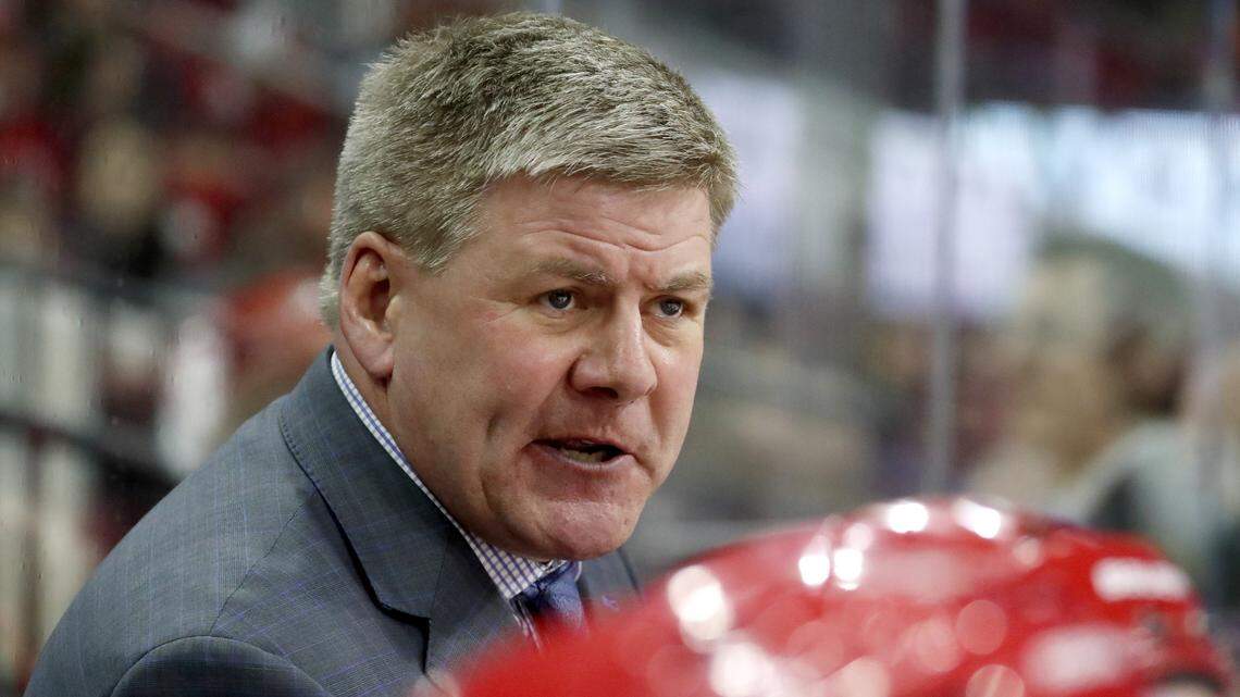 In this file photo, former Carolina Hurricanes head coach Bill Peters directs the team in a game at PNC Arena on March 26, 2018.