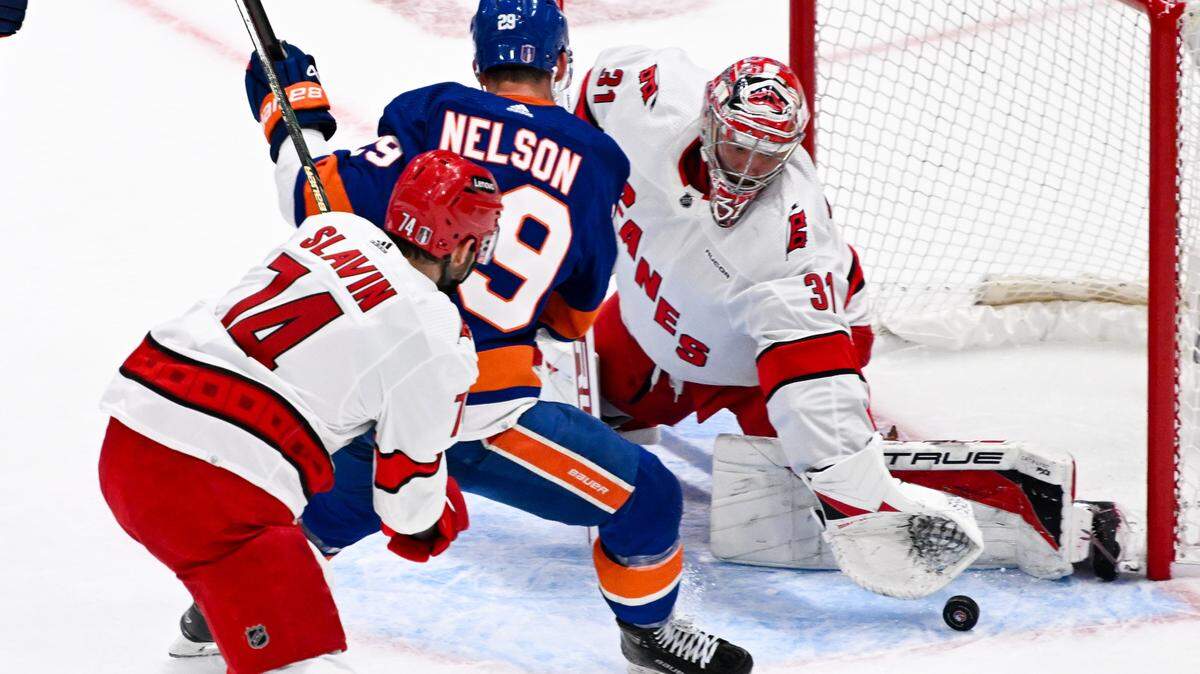 Carolina Hurricanes goaltender Frederik Andersen (31) makes a save against the New York Islanders during the first period in game three of the first round of the 2024 Stanley Cup Playoffs at UBS Arena.