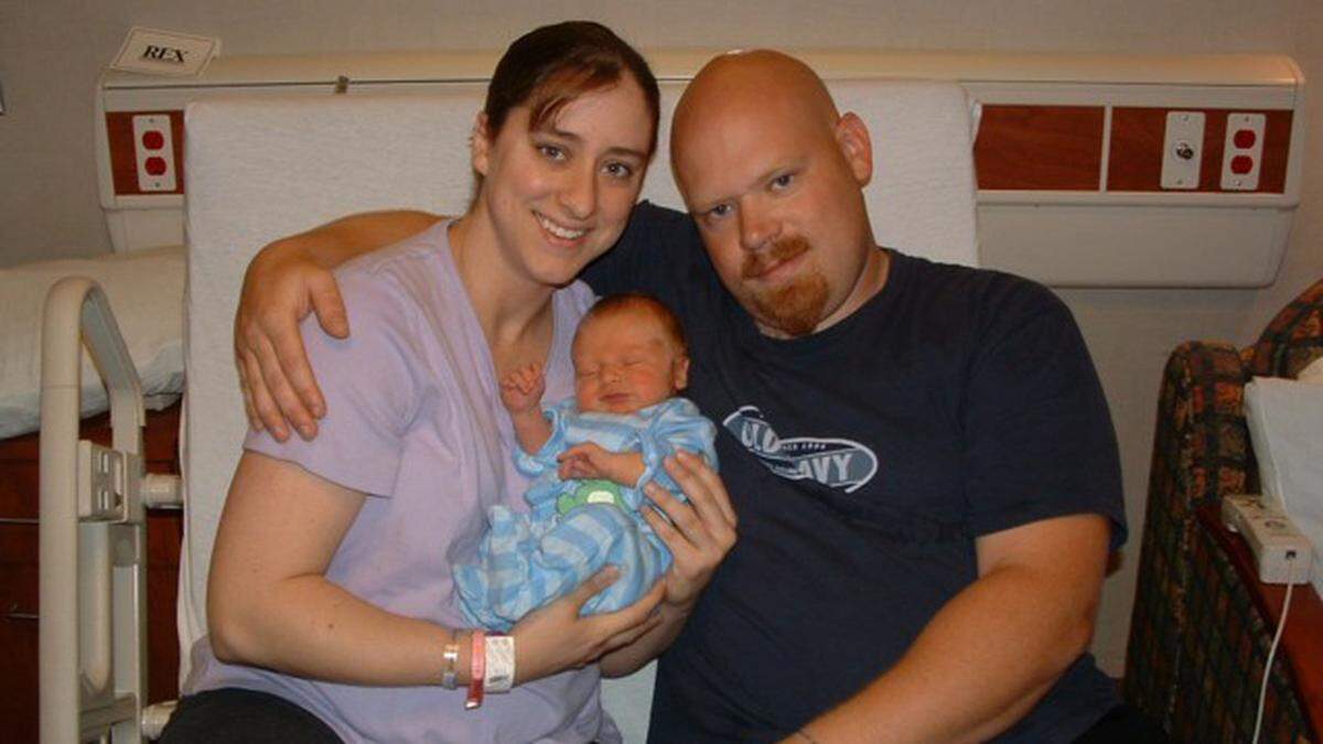 Bryan Tutor, right, with his wife Mandy Tutor and son son Carson Brantley Tutor.