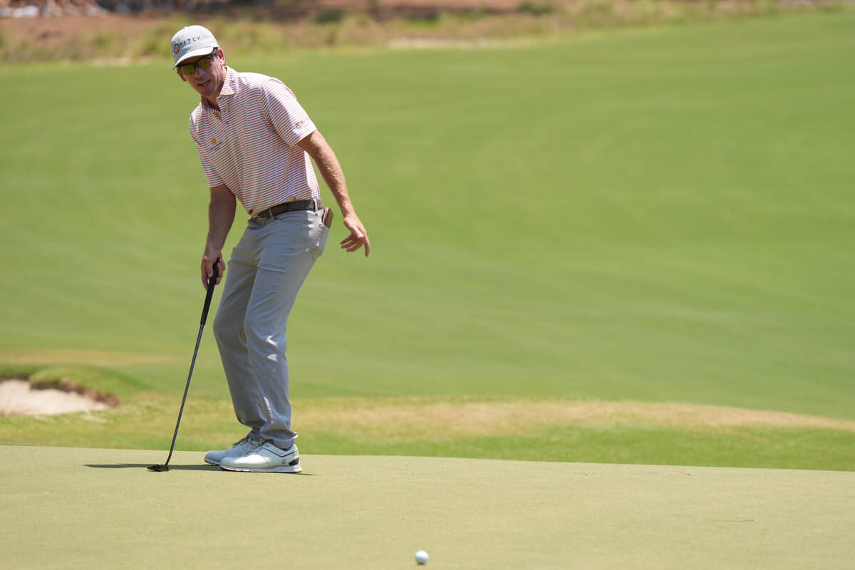 Ben Kohles reacts after putting on the 16th green during the third round of the U.S. Open golf tournament.