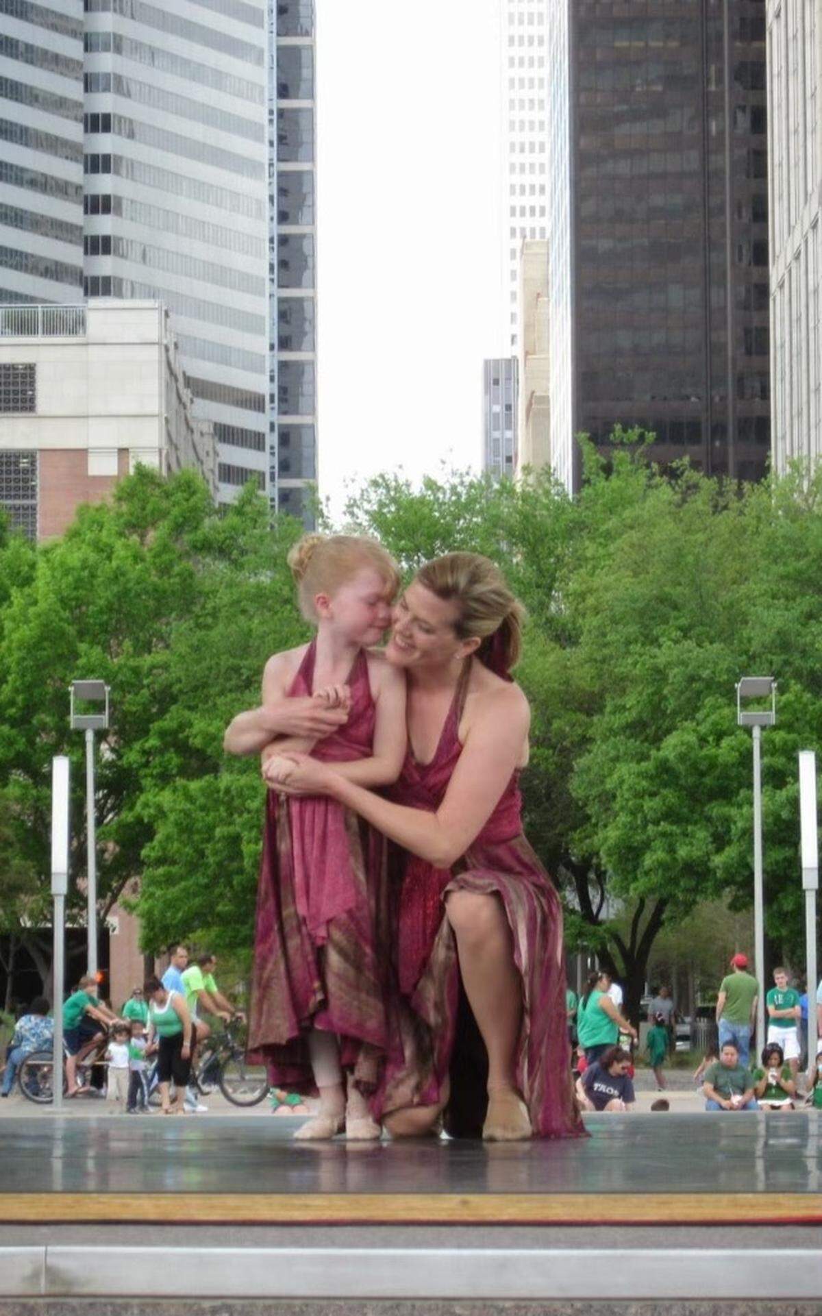 Cheryl Cutlip and her daughter, Ava, dance on stage together for the first time at the 2012 Project Dance event in Houston, Texas. On July 19, the Cutlips gathered with hundreds of other dancers from around the world in Place de la République for the opening event of this year’s Paris showcase.