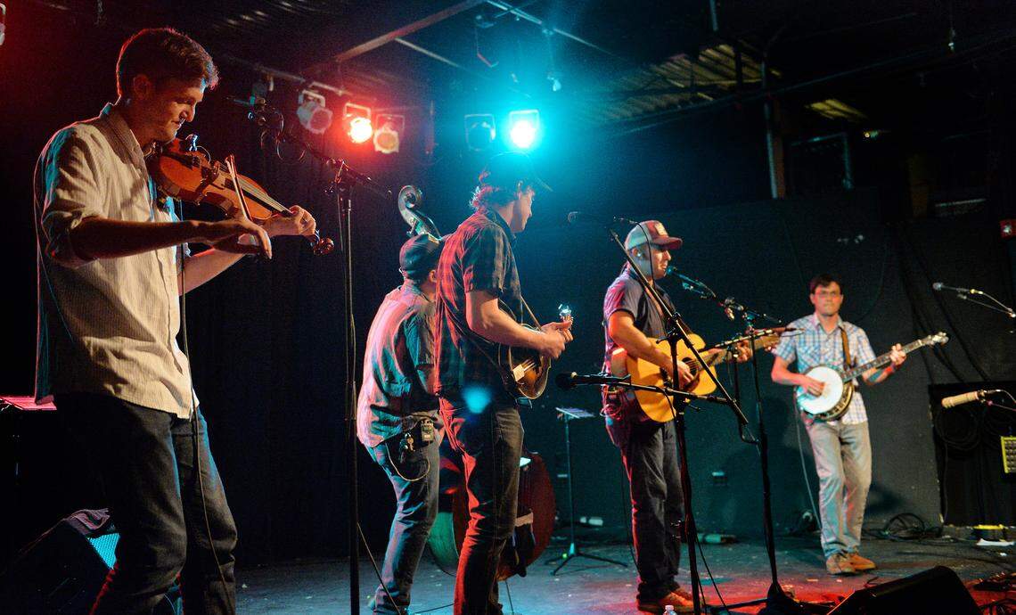 Bobby Britt (left) on fiddle with the bluegrass band Town Mountain playing a show at Cat’s Cradle in Carrboro, N.C. Aug. 10, 2018.