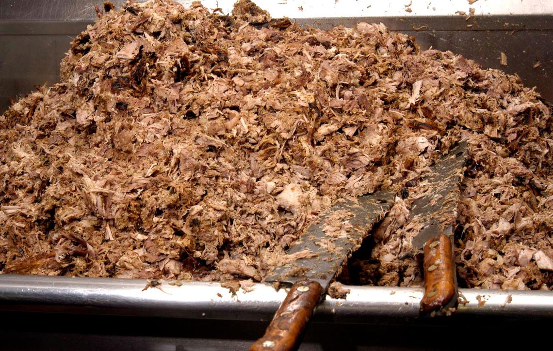 Freshly chopped meat tantalizes at Allen & Son in Chapel Hill, which N&O restaurant critic Greg Cox rates the best barbecue around.2004 NEWS & OBSERVER FILE PHOTO