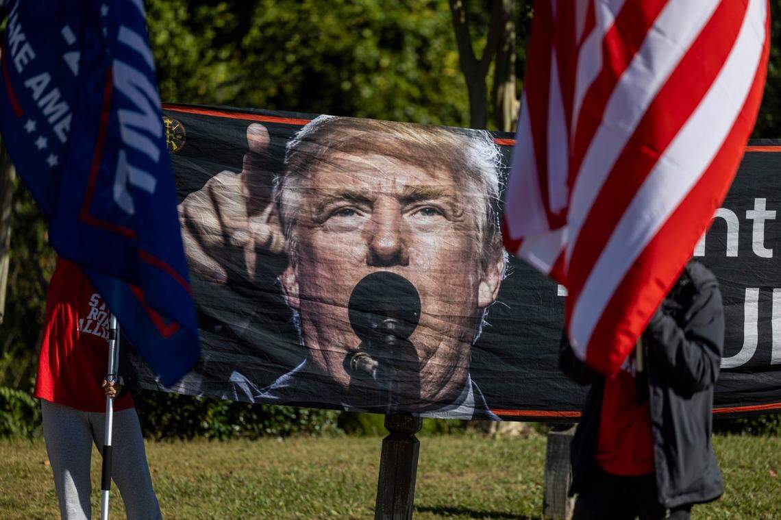 Supporters of former President Donald Trump gather outside Minges Coliseum in Greenville prior to a rally on Monday, Oct. 21, 2024. With two weeks until Election Day, Trump went on a three-city tour, in which Trump will also see the destruction caused by Hurricane Helene in Asheville and speak at a faith conference in Concord.