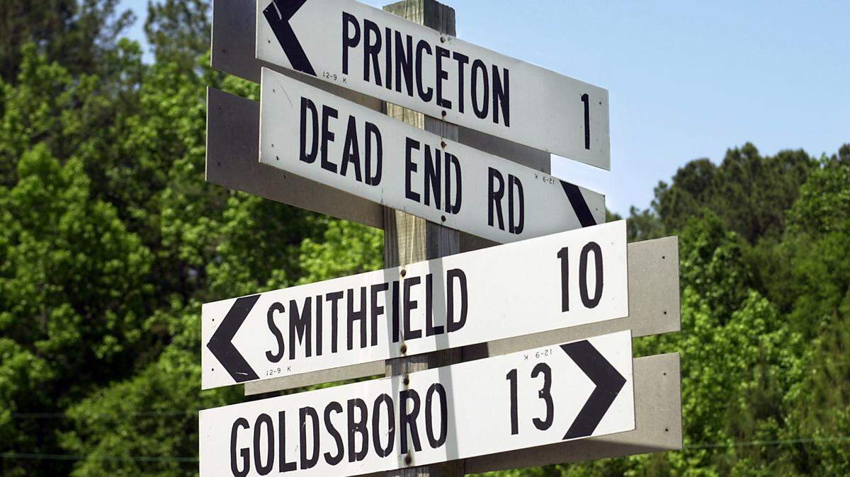 A sign near Princeton points the way to other towns in May 2001.