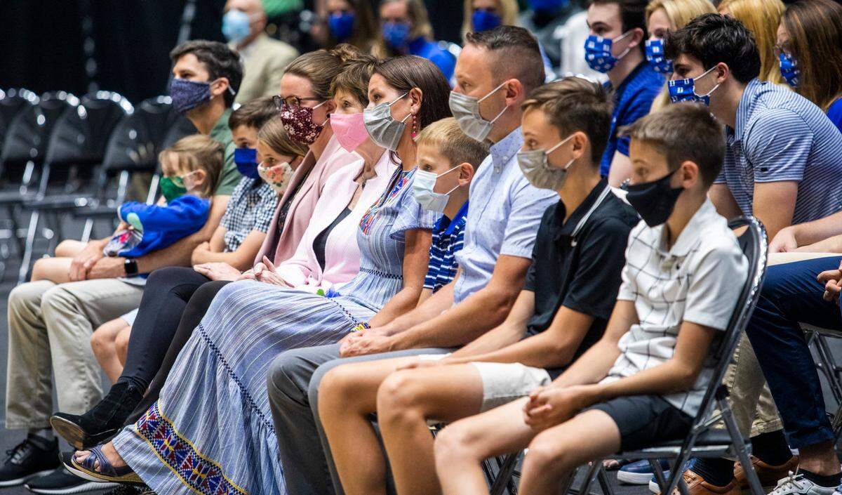 Members of Duke University basketball coach Mike KrzyzewskiÕs family listen as he announces his retirement at the conclusion of the 2021-22 season during a press conference at Cameron Indoor Stadium Thursday, June 3, 2021. Duke associate head coach Jon Scheyer will be the coach-in-waiting before taking over the program as its next head coach in 2022, Duke announced on Wednesday.
