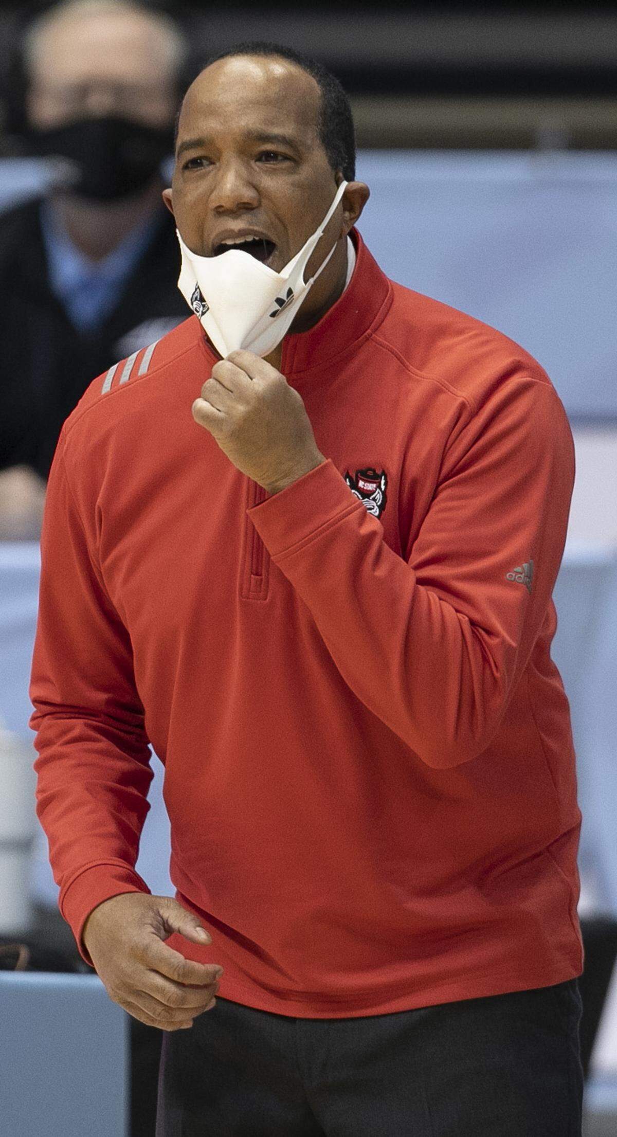 N.C. State coach Kevin Keatts directs his team on defense in the first half against North Carolina on Saturday, January 23, 2021 at the Smith Center in Chapel Hill, NC.