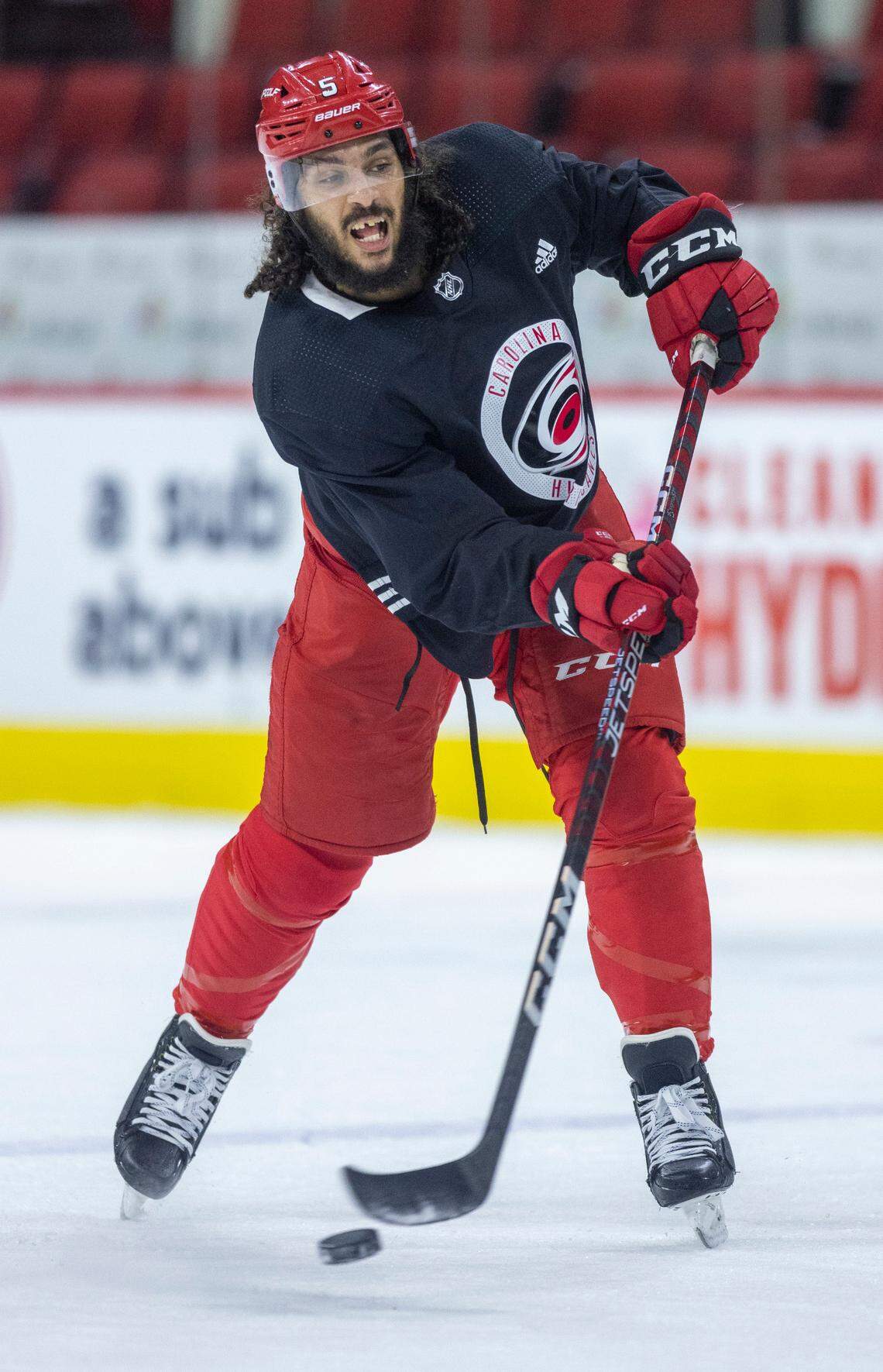 The Carolina Hurricanes Jalen Chatfield (5) works on his shooting form during the Hurricanes’ practice on Monday, May 15, 2023 at PNC Arena in Raleigh, N.C.
