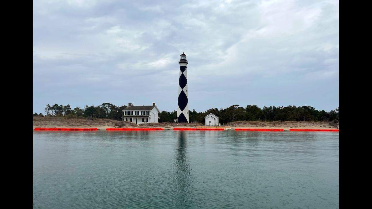 The odd coloration along the sound side of Harker’s Island is a wave attenuation system to help curb beach erosion, the National Park Service says.