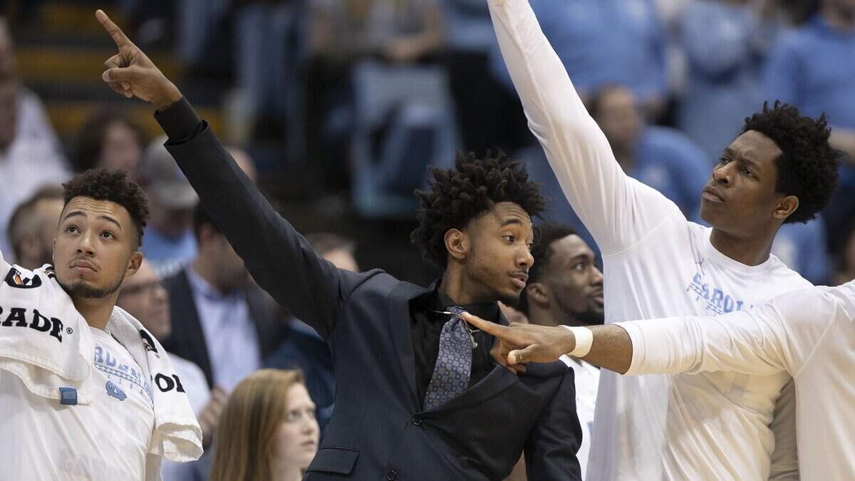 North Carolina’s Leaky Black (1) and Sterling Manley (21) react after a turnover by Syracuse in the second half on Tuesday, February 26, 2019 at the Smith Center in Chapel Hill, N.C.