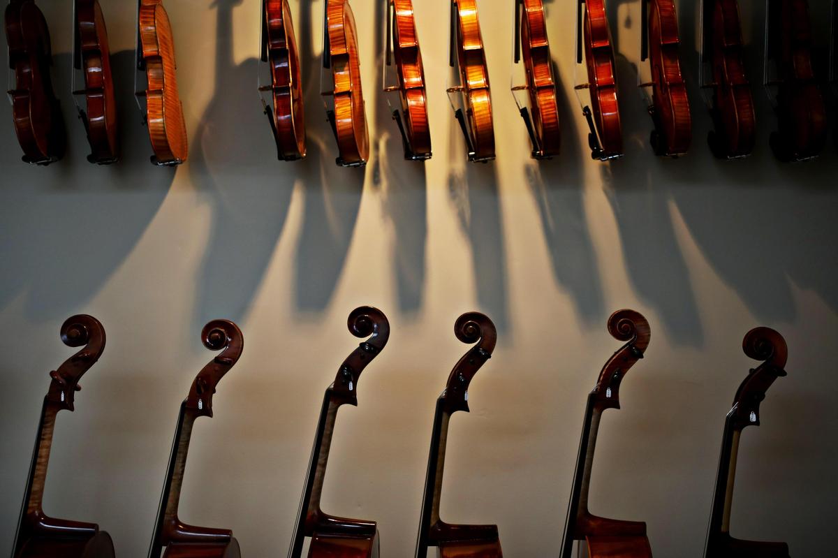 Violin maker John Montgomery makes and repairs violins, violas and cellos at his shop, Violin Maker, on Raleigh’s Hillsborough Street.
