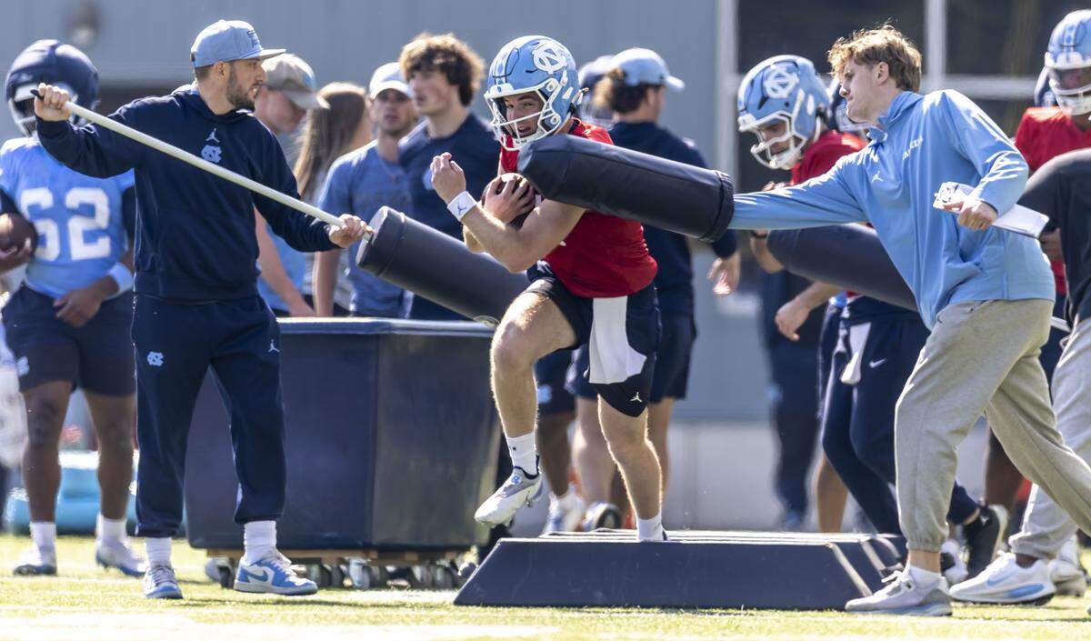 North Carolina quarterback Andres Miyares Jr. (18) runs through a ball handling drill during the Tar Heels’ spring practice, on Tuesday, March 24, 2026, at Kenan Stadium Chapel Hill, N.C.