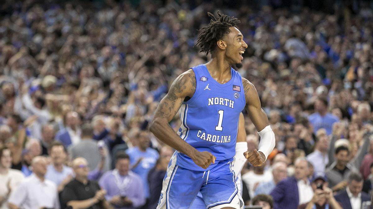 North Carolina’s Leaky Black (1) celebrates the Tar Heels’ 81-77 victory over Duke as time expires during the NCAA Final Four semi-final on Saturday, April 2, 2022 at Caesars Superdome in New Orleans, La.