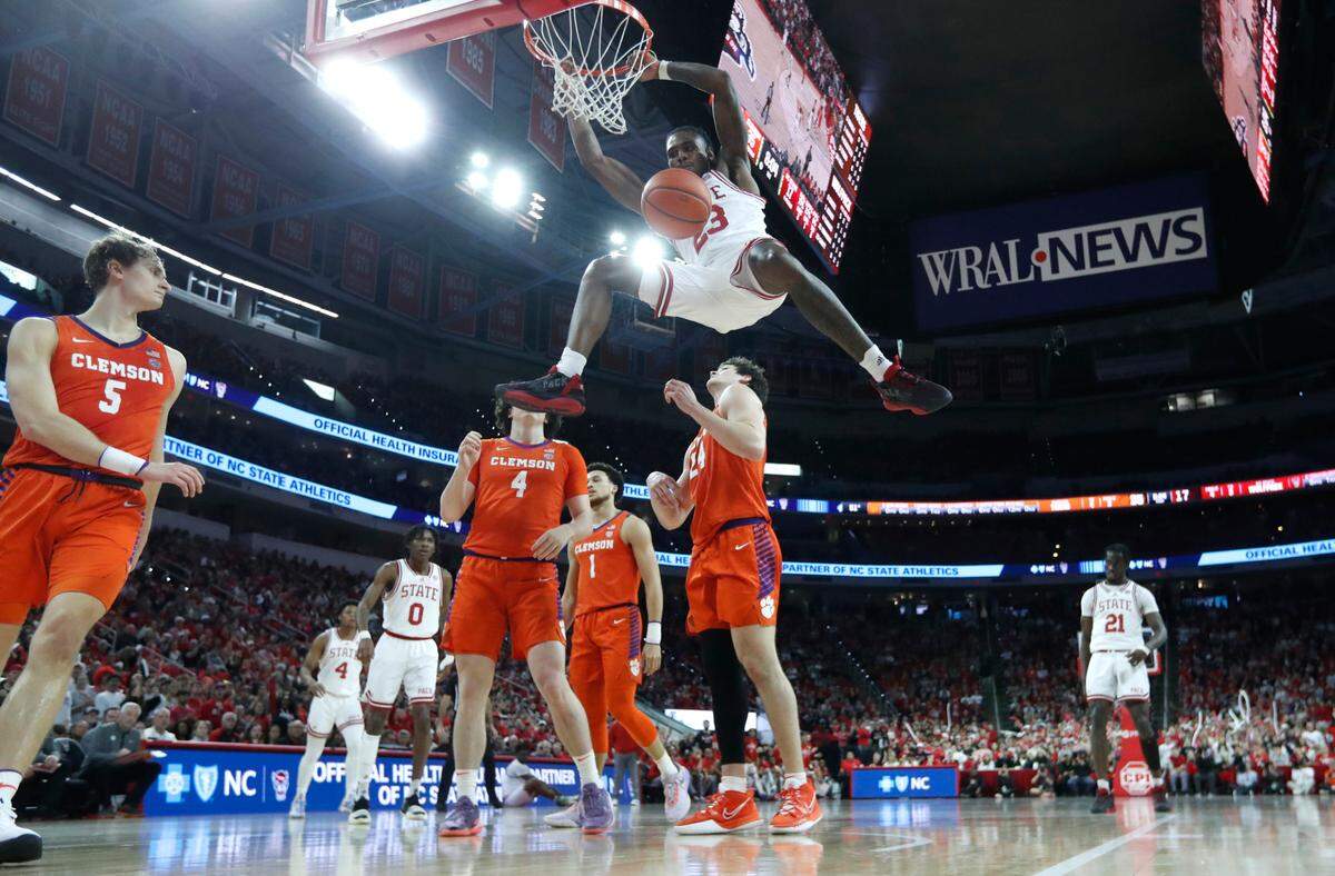 N.C. State’s Greg Gantt (23) slams in two during Clemson’s 96-71 victory over N.C. State’s game at PNC Arena in Raleigh, N.C., Saturday, Feb. 25, 2023.