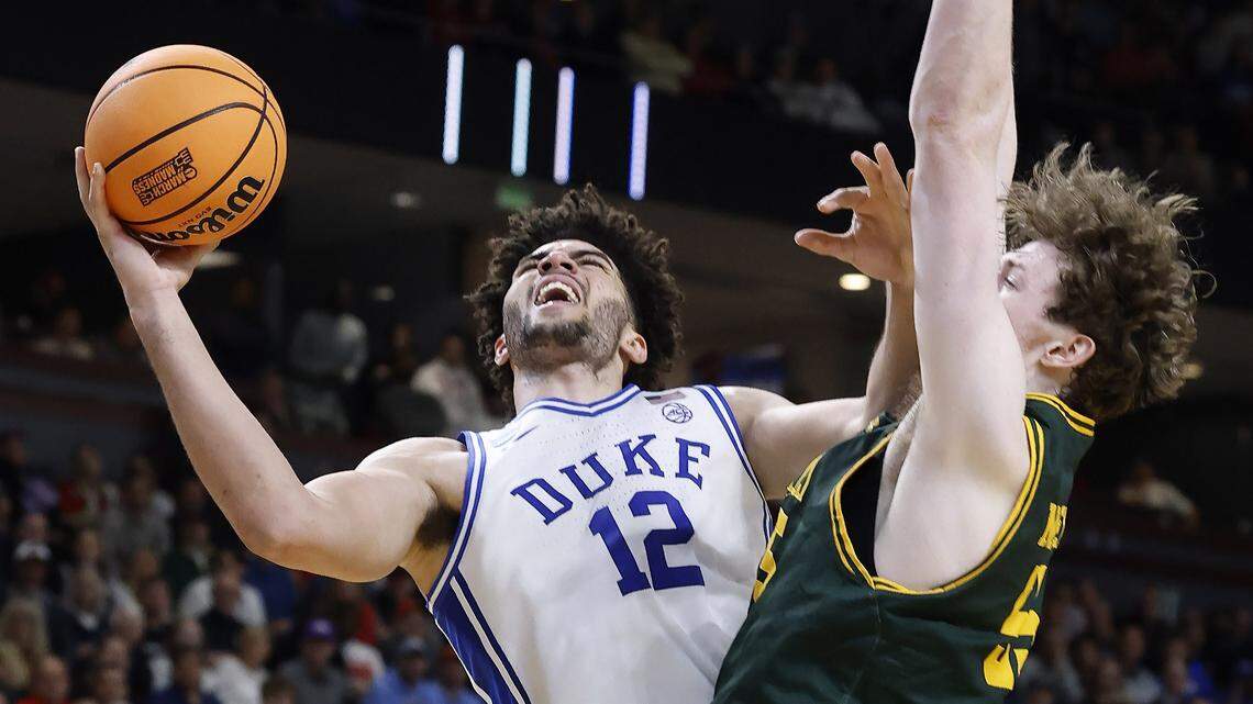 Tournament favorite Duke survives Siena upset bid to advance in March Madness