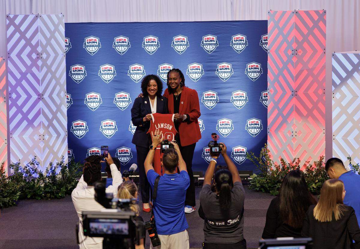 Duke women’s basketball head coach Kara Lawson poses for a photograph after being named the 2025-2028 USA Basketball Women’s National Team head coach during a ceremony at Cameron Indoor Stadium on Tuesday, Sept. 23, 2025, in Durham, N.C.