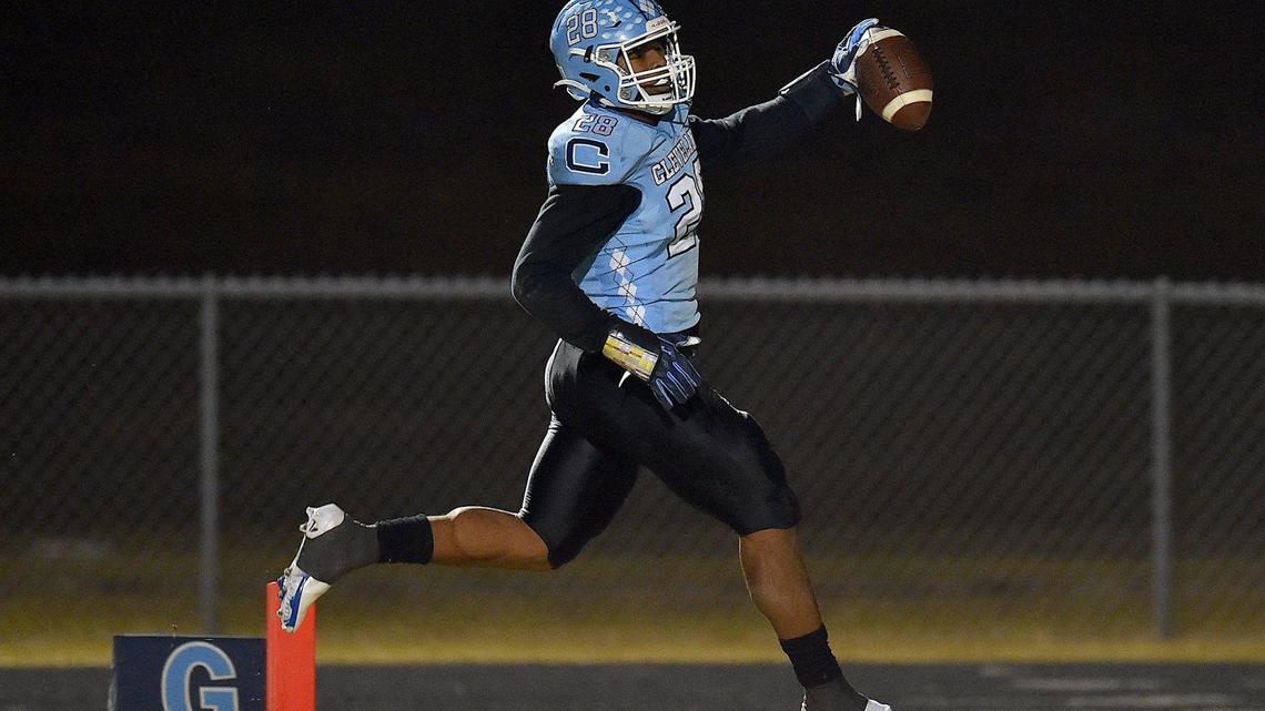 Cleveland’s Omarion Hampton (28) runs it in for the touchdown during the first half. The Cardinal Gibbons Crusaders and the Cleveland Rams met in the third round of the NCHSAA 4A football playoffs on November 19, 2021