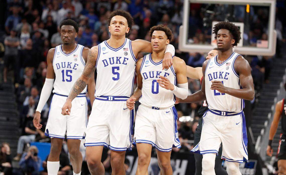 Dukes Mark Williams (15), Paolo Banchero (5), Wendell Moore Jr. (0) and AJ Griffin (21) head back towards their basket during the second half of Dukes 78-73 victory over Texas Tech in the Sweet 16 round of the NCAA Tournament at the Chase Center in San Francisco, Calif., Thursday, March 24, 2022.