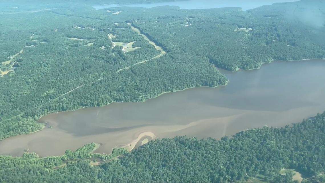 Sediment from Lick Creek is making its way downstream into a branch Falls Lake, as shown in this photo from an aerial flight taken in June 2023. Sound Rivers is suing Clayton Properties Group, alleging sediment from its Sweetbrier development is impacting Martin Branch and then Lick Creek before reaching Falls Lake.