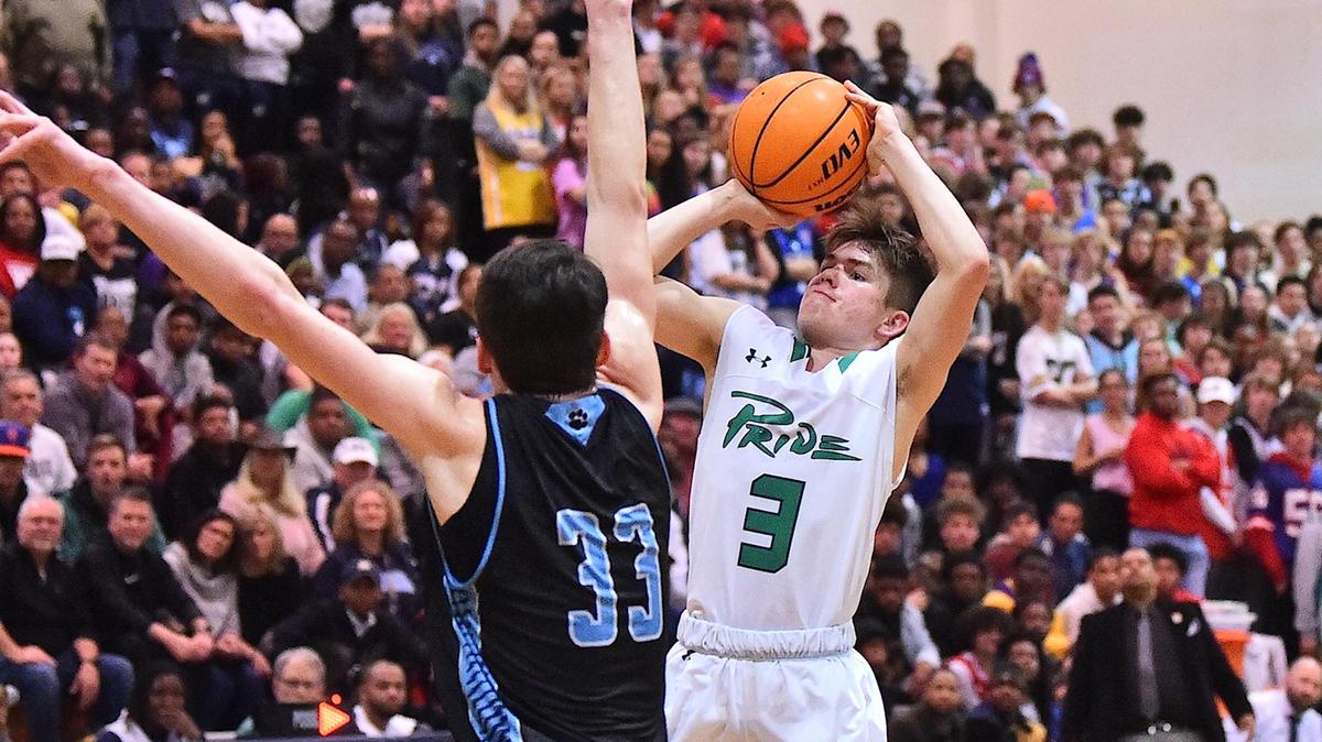 Leesville Road’s Chase Hakerem (3) attempts the jump shot against Millbrook’s Sam Hood (33). The Leesville Pride and the Millbrook Wildcats met in a basketball game in Raleigh, N.C. on January 31, 2020.