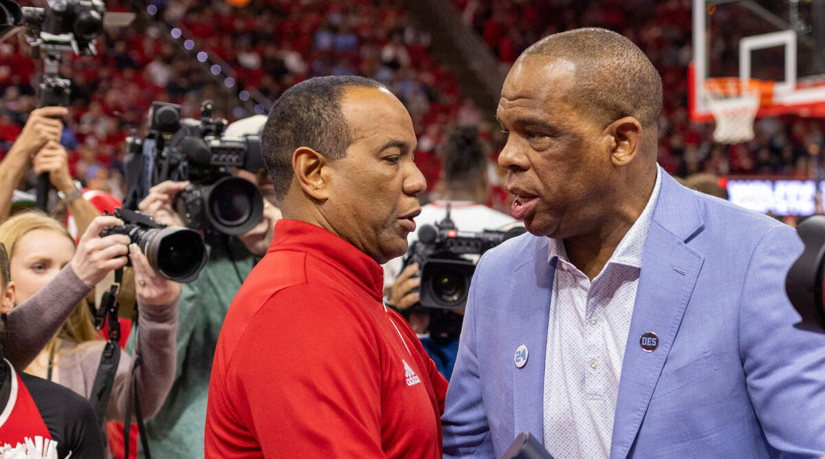 N.C. State coach Kevin Keatts greets North Carolina coach Hubert Davis prior to their game on Wednesday, January 10, 2024 at PNC Arena in Raleigh, N.C.