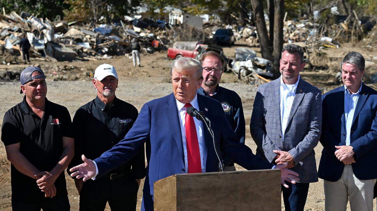 Former President Donald J. Trump addresses the media in Swannanoa, NC on Monday, October 21, 2024 following his tour of damage caused by Hurricane Helene in the local area.