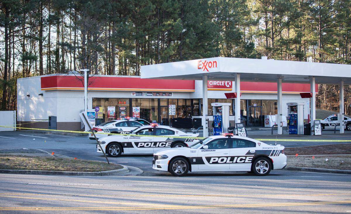 A heavy Durham police presence remains at the Circle K gas station in Durham, N.C. near Fayetteville Road and N.C. Highway 54 after a man was fatally shot by officers there early Wednesday morning, Jan. 12, 2022.