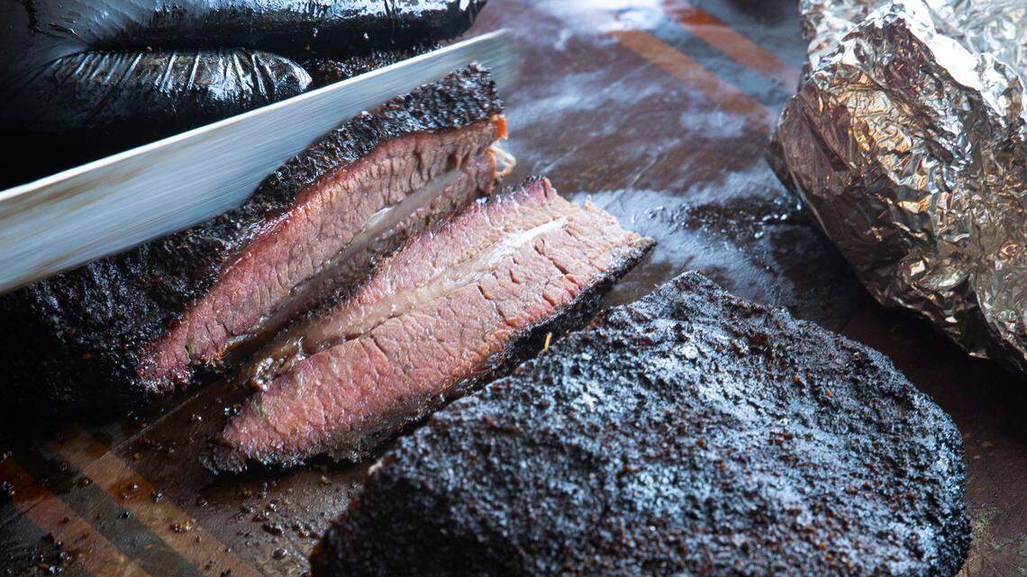 A luscious beef brisket is sliced to order at Dampf Good Barbecue in Morrisville.