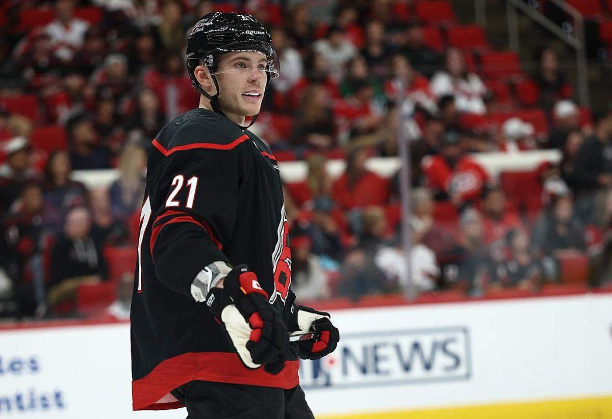 Alexander Nikishin of the Carolina Hurricanes looks on during the first period of the game against the New Jersey Devils at Lenovo Center on October 09, 2025 in Raleigh, North Carolina.
