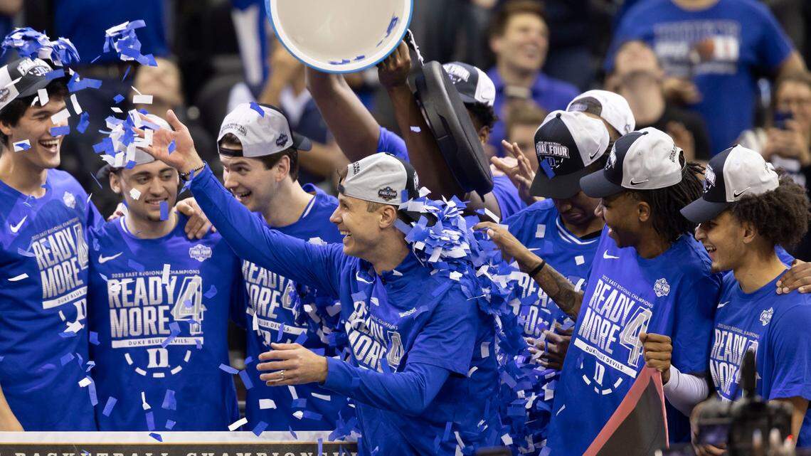 Duke coach Jon Scheyer celebrates with his team after their 85-65 victory over Alabama on Saturday, March 29, 2025 during the NCAA East Regional final at Prudential Center in Newark, N.J.