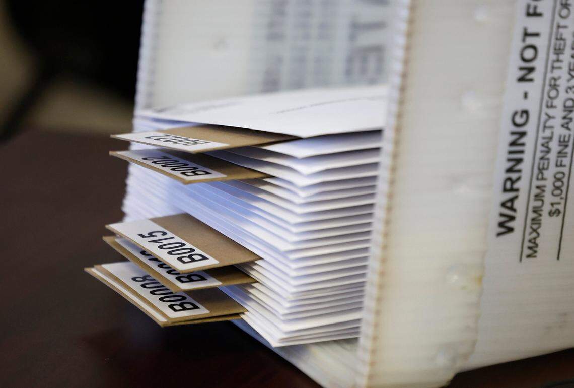 Absentee ballots are prepared to be sent out at the Wake County Board of Elections Operations Center in Raleigh, N.C., Tuesday, Oct. 8, 2024.