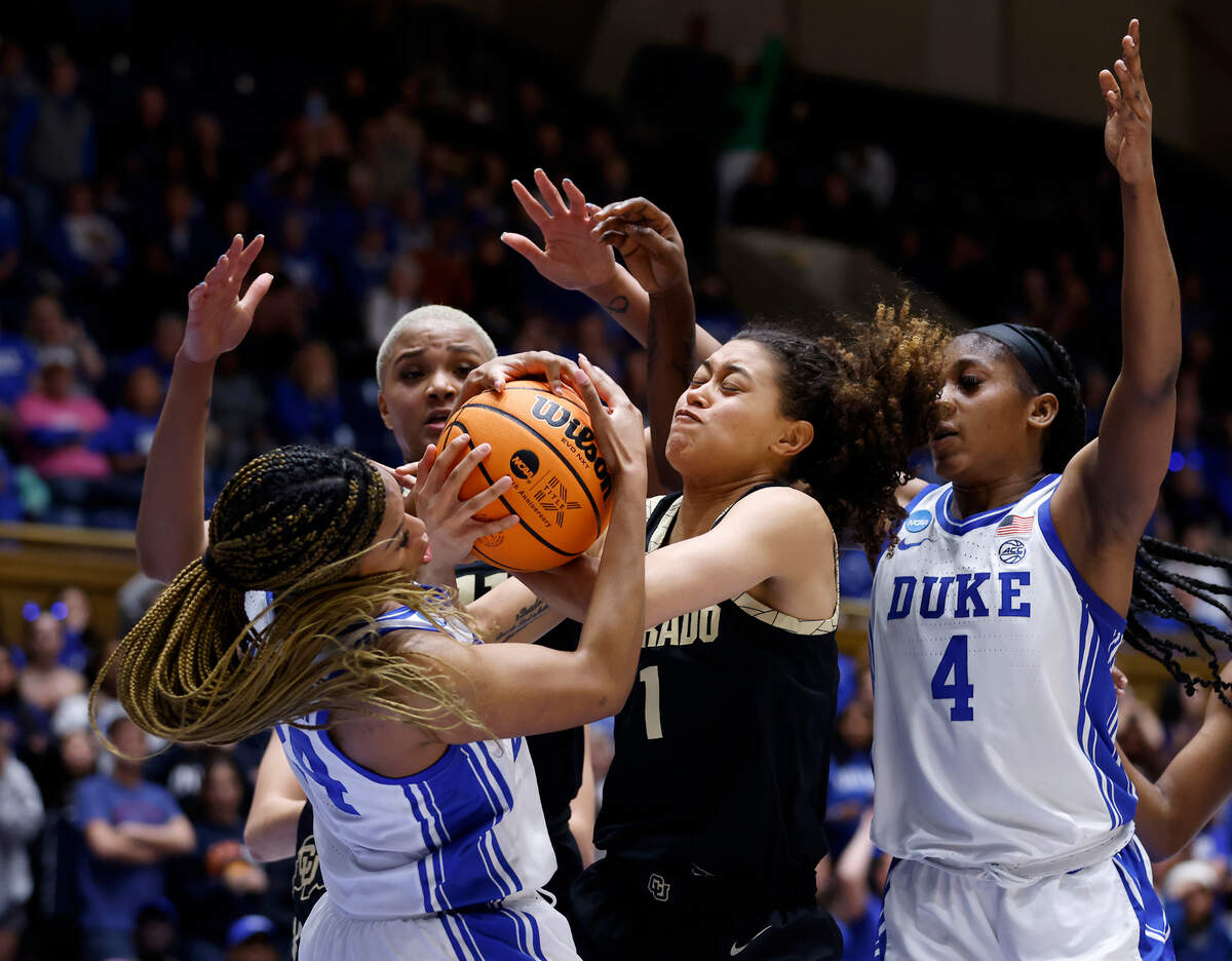 Duke’s Reigan Richardson and Elizabeth Balogun pressure Colorado’s Tayanna Jones during the second half of the Blue Devils’ 61-53 loss to Colorado in an NCAA Tournament second round game at Cameron Indoor Stadium on Monday, March 20, 2023, in Durham, N.C.