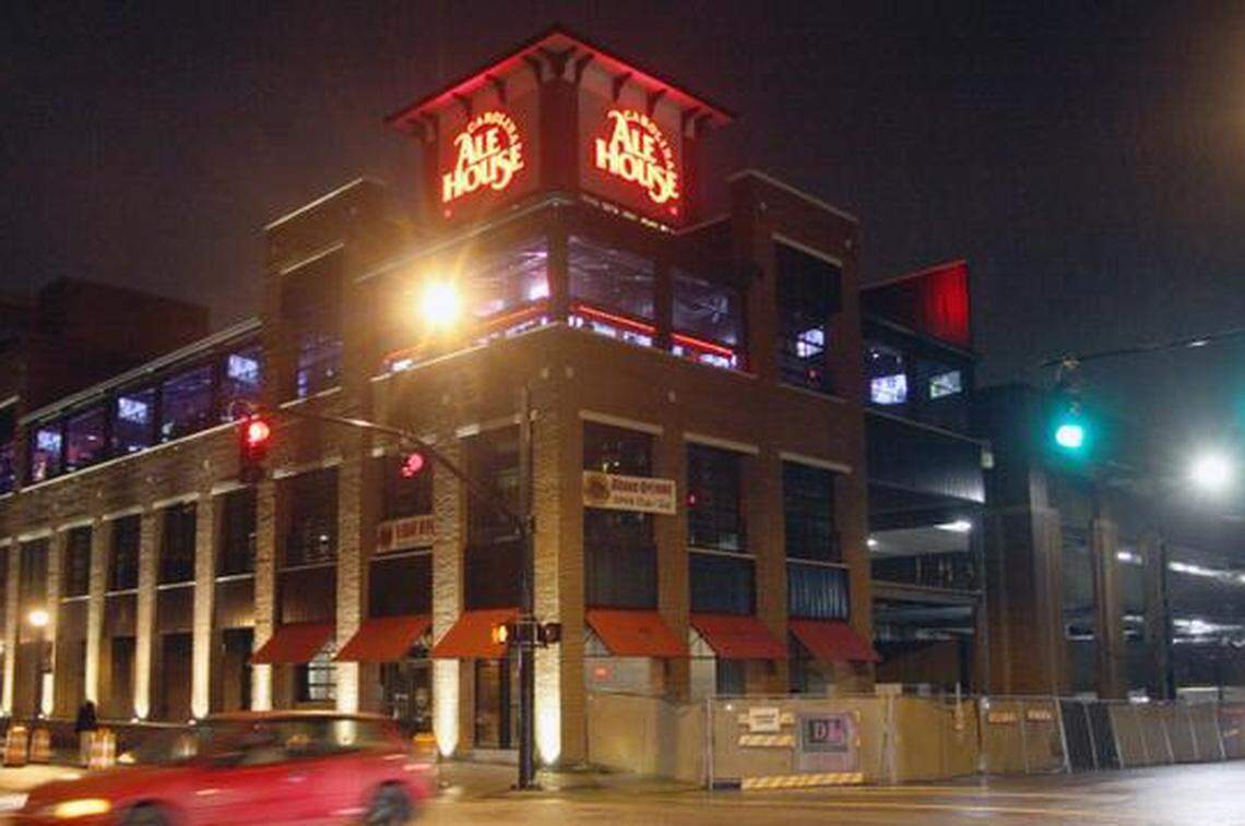 Carolina Ale House at Glenwood South features bars inside and out, TVs over the bars and a wide range of beers and mixed drinks.