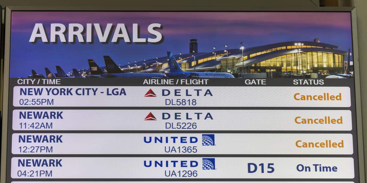 A few flights, mostly from the northeastern United States, are shown canceled on monitors at Raleigh-Durham International Airport on Monday, Jan. 26, 2026.  The northeast was particularly hard hit my winter storms over the weekend. 