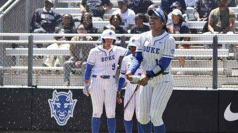 Duke outfielder D’Auna Jennings shakes a water bottle in celebration after the Blue Devils hit a home run during their NCAA Tournament regional game against Howard at Smith Family Stadium in Durham, North Carolina, on May 15, 2026.