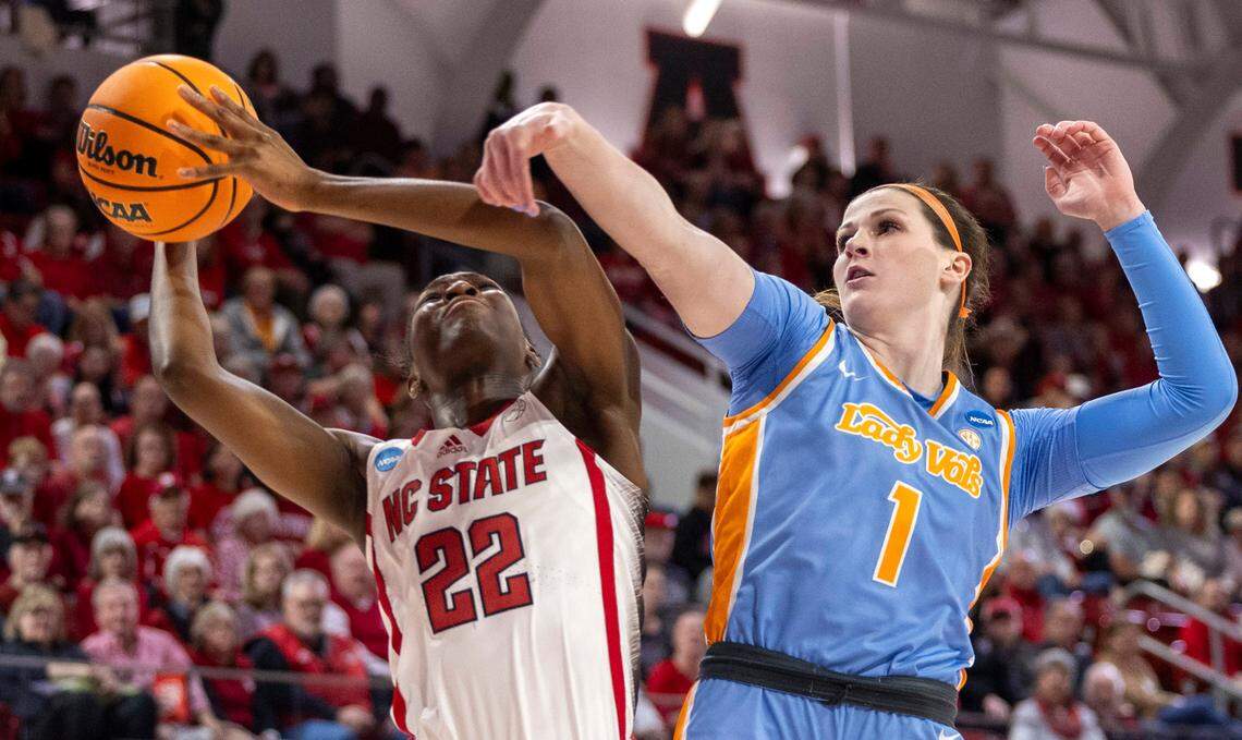 NC State’s Saniya Rivers (22) shoots as Tennessee’s Sara Puckett (1) defends during the first half of the second round of the Division I Women’s Basketball Championship at Reynolds Coliseum in Raleigh, North Carolina, on March 25, 2024.