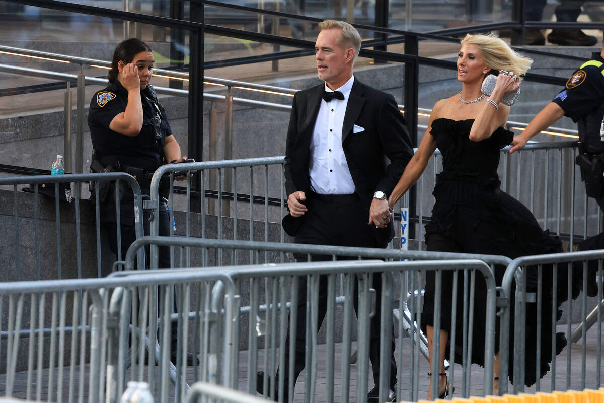 Joe Buck and Michelle Beisner-Buck arrive at Madison Square Garden, the venue for the reported wedding celebrations of singer Taylor Swift and National Football League (NFL) player Travis Kelce, in New York, U.S., July 3, 2026.  REUTERS/Brendan McDermid
