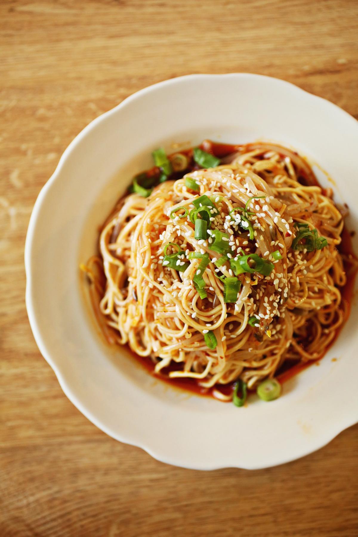 Chengdu 7’s Sichuan style cold noodles are tossed in a chile-flecked sheen of sesame oil and soy sauce.