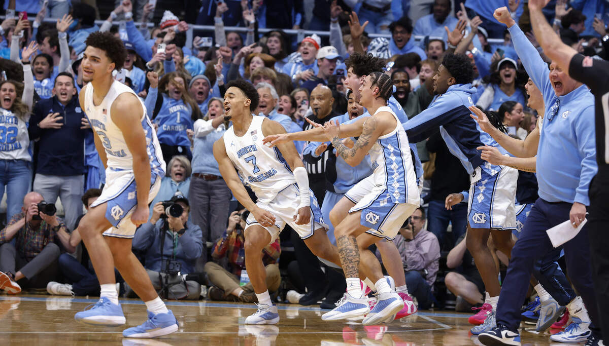 North Carolina's Seth Trimble (7) celebrates after making the game winning basket in UNC’s 71-68 victory over Duke at the Dean E. Smith Center in Chapel Hill, N.C., Saturday, Feb. 7, 2026.