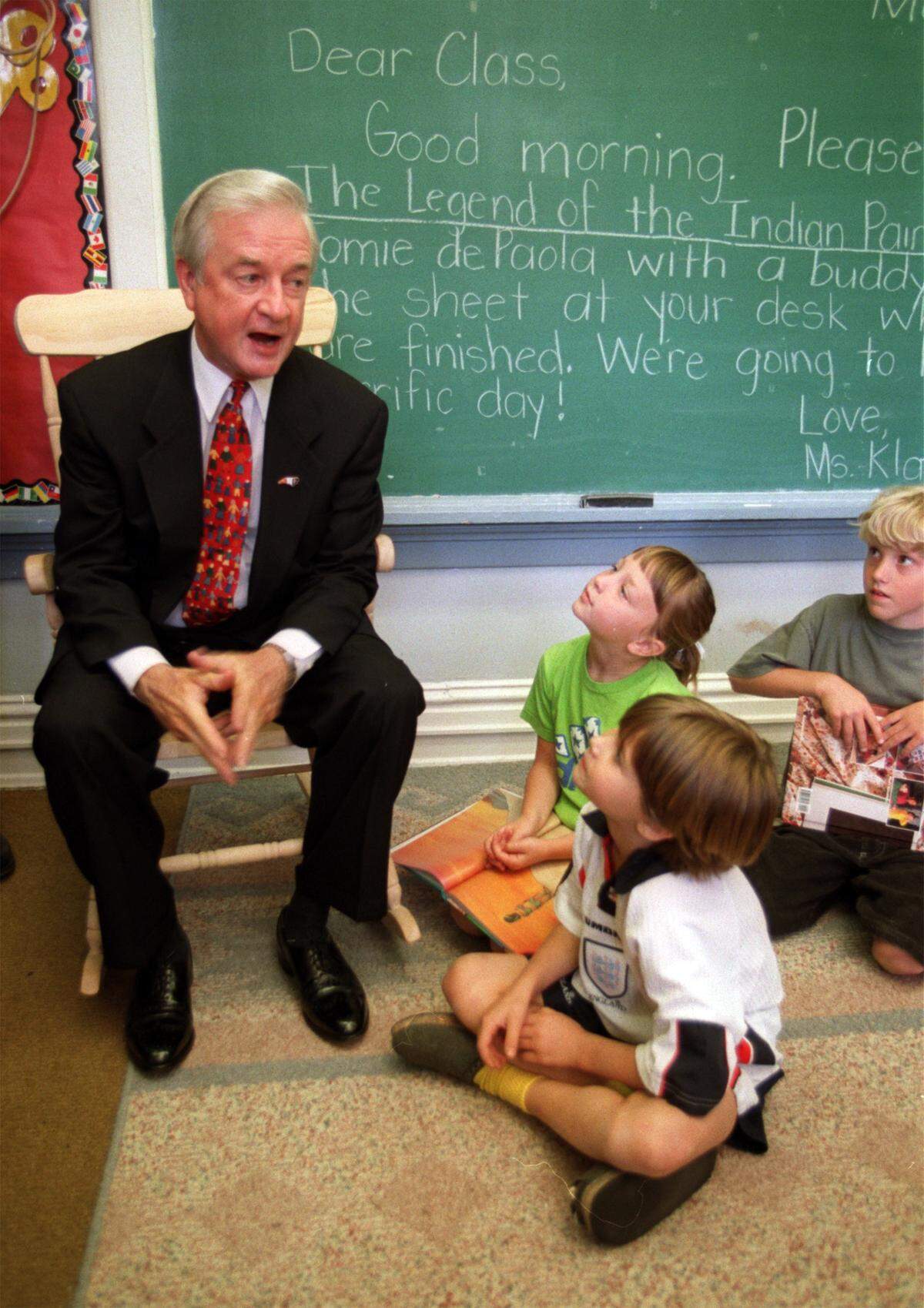 In a 1999 file photo, Governor Jim Hunt takes a few minutes to visit with a 2nd grade class at Underwood Elementary School in 1999.