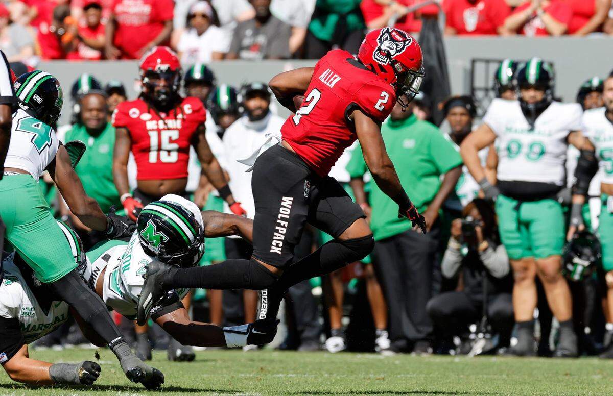 N.C. State running back Michael Allen (2) gains yards during the first half of N.C. State’s game against Marshall at Carter-Finley Stadium in Raleigh, N.C., Saturday, Oct. 7, 2023.